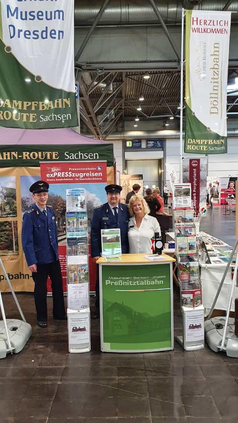 Steffen, Andreas und Christa vom Marketingteam der Preßnitztalbahn am Messestand.